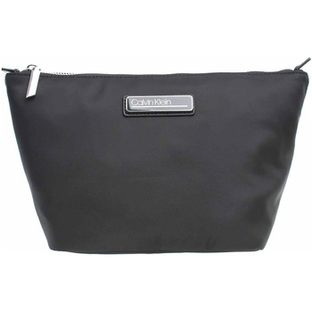 Taška Náprsní tašky Calvin Klein Jeans dámská kosmetická taška K60K607179 BAX Ck black Černá