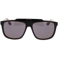 Hodinky & Bižuterie Muži sluneční brýle Gucci Occhiali da Sole  GG1039S 001 Černá